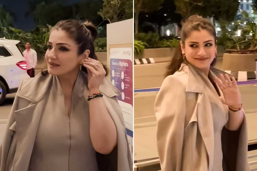 Raveena Tandon Gifts Gold Earrings To Paparazzo At Airport