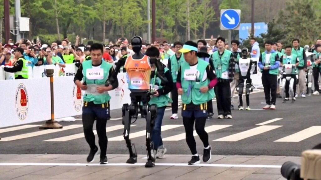 World First Half Marathon For Humanoid Robot And Human