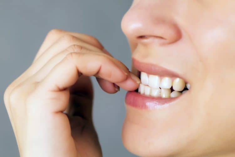 Nail Biting Can Cause Stomach, Skin, and Dental Issues