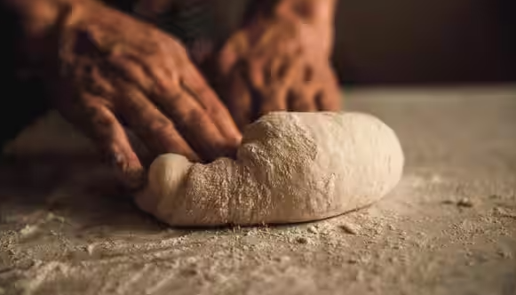 Why are fingerprints left after kneading dough?